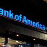 Bank of America building with illuminated sign.