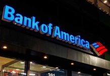 Bank of America building with illuminated sign.