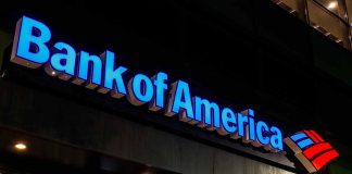 Bank of America building with illuminated sign.