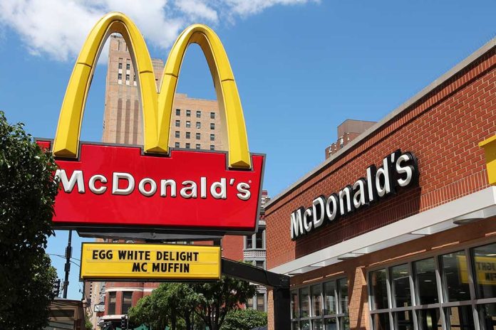 McDonald's restaurant with large advertising sign outside.