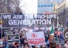 Prolife march with large banner and signs