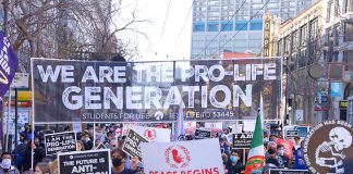 Prolife march with large banner and signs