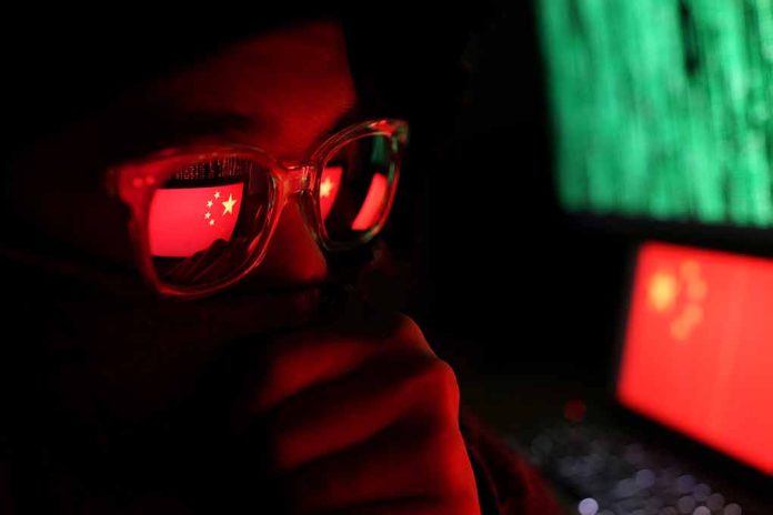 Person with glasses reflecting Chinese flag and computer screens