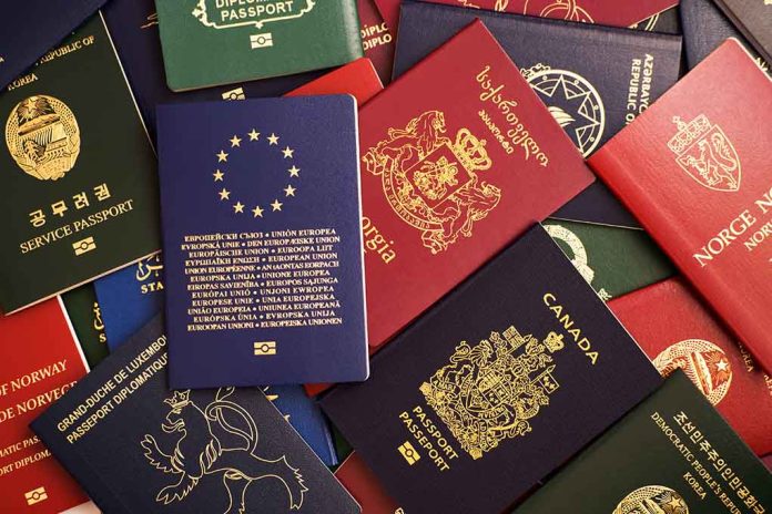 Various colorful international passports spread out.