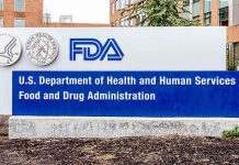 FDA building sign with logos outside.