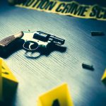 Revolver on table at crime scene investigation display