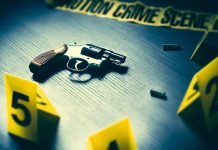 Revolver on table at crime scene investigation display